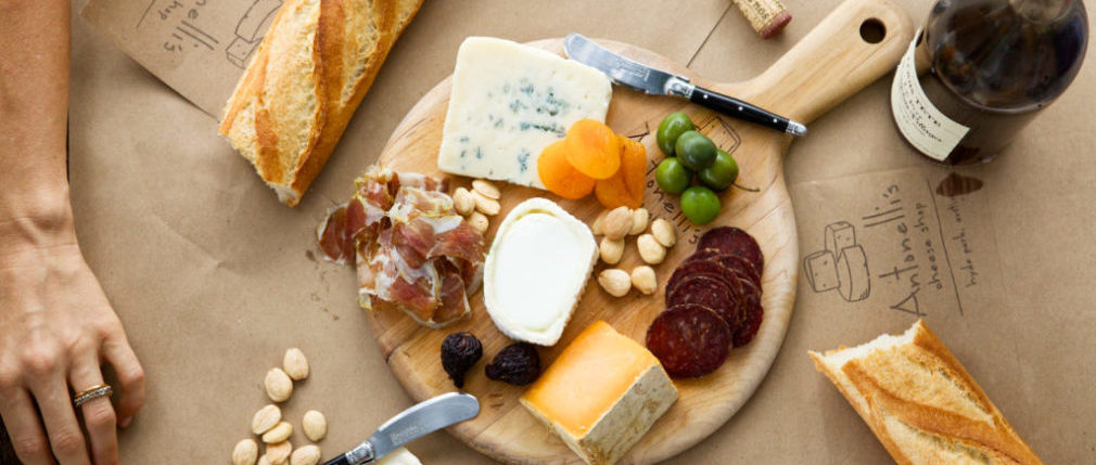 00 ANTONELLIS Cheese Board spread photo by Kate LaSueur 1024x683 1 e1596140698994