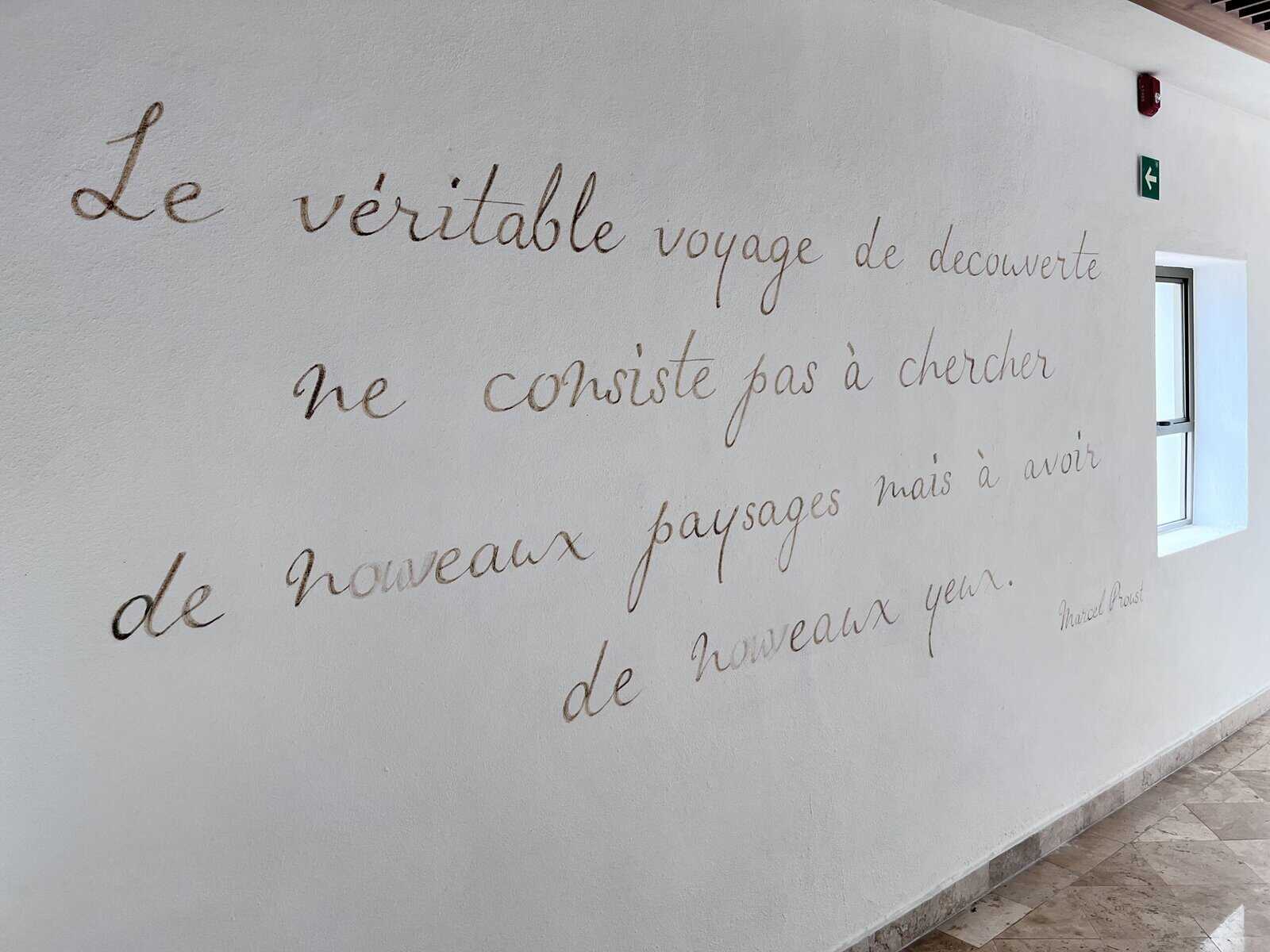 Quote written on a wall in hotel