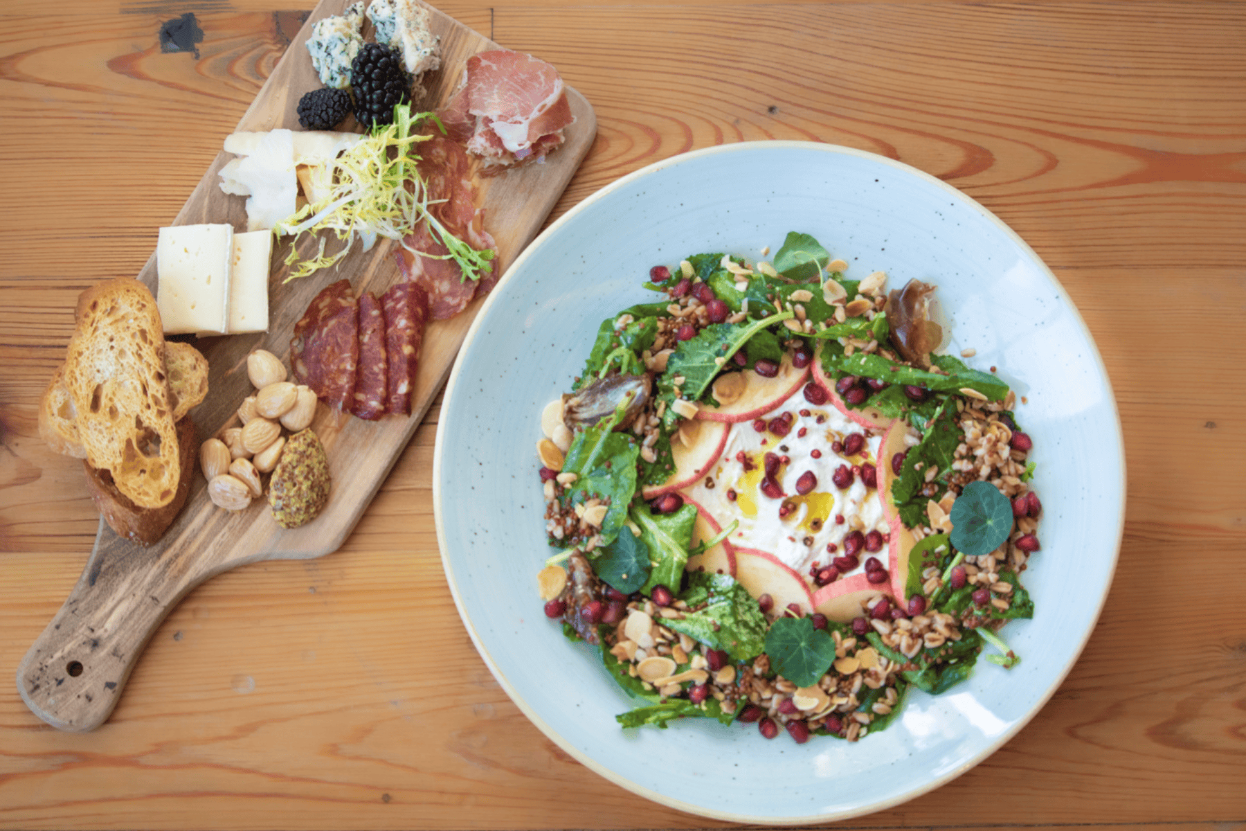 Charcuterie board and salad at Octagon restaurant.
