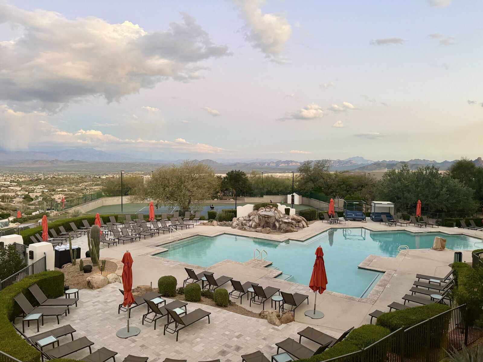 Large pool with mountains in the distance
