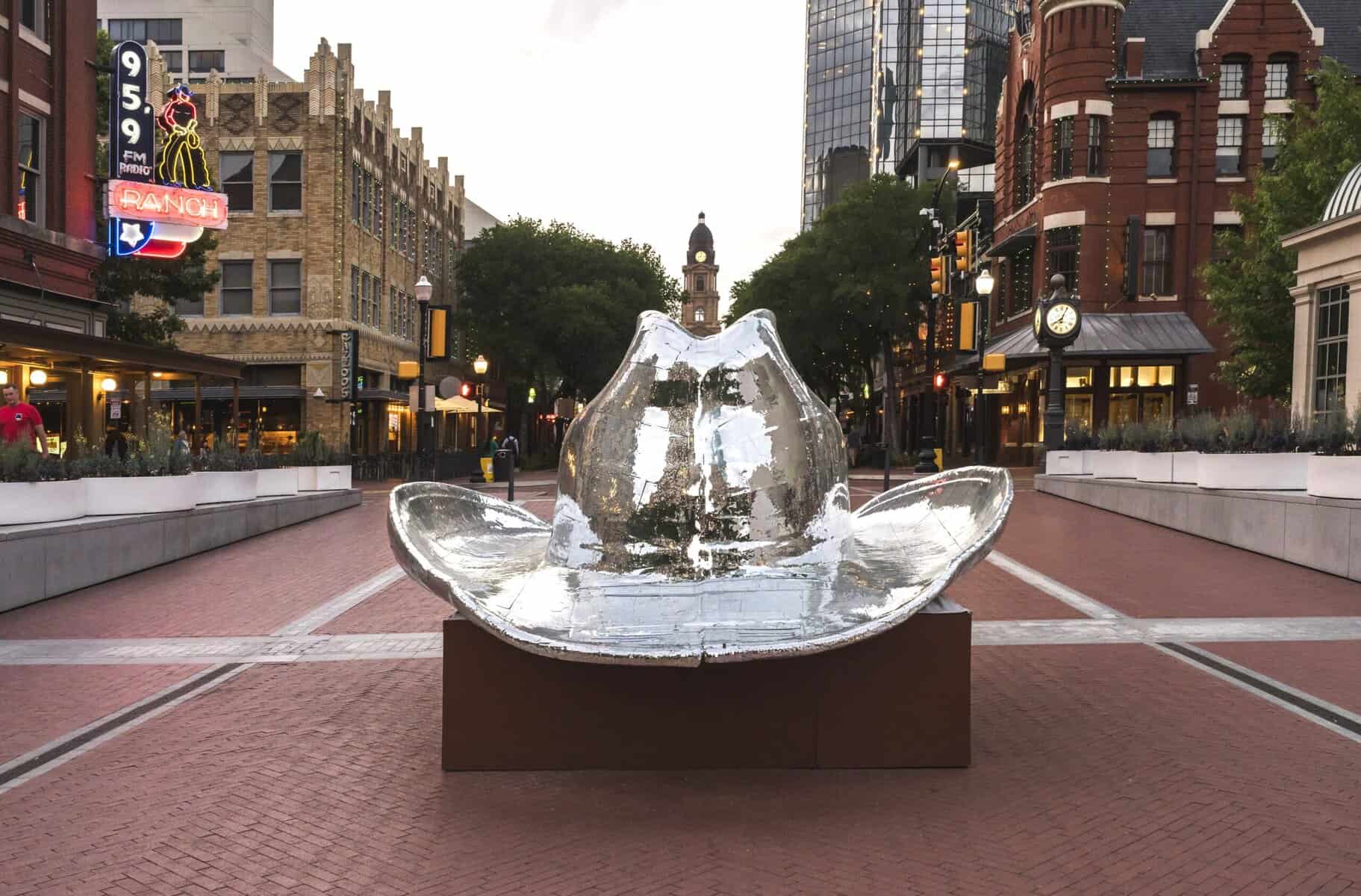 Silver hat sculpture.