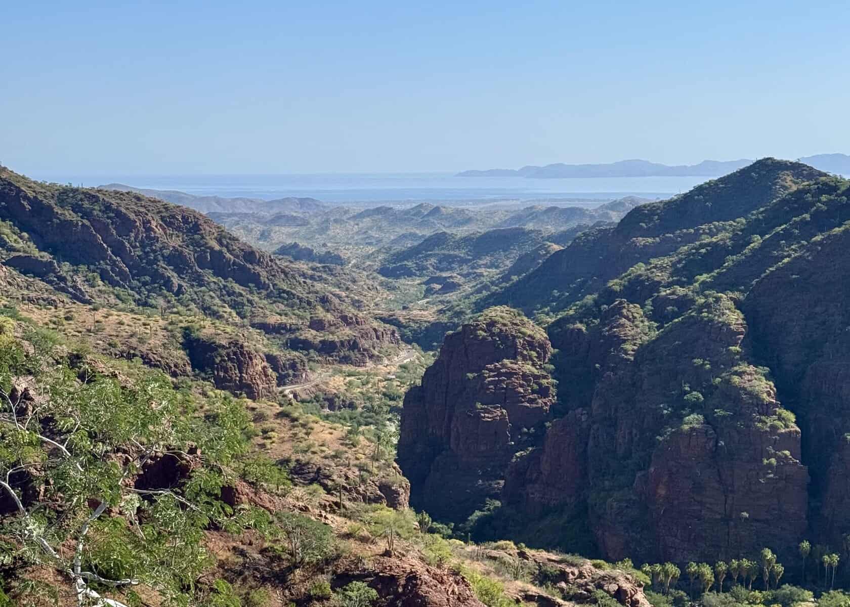 Mountains lead down to the sea